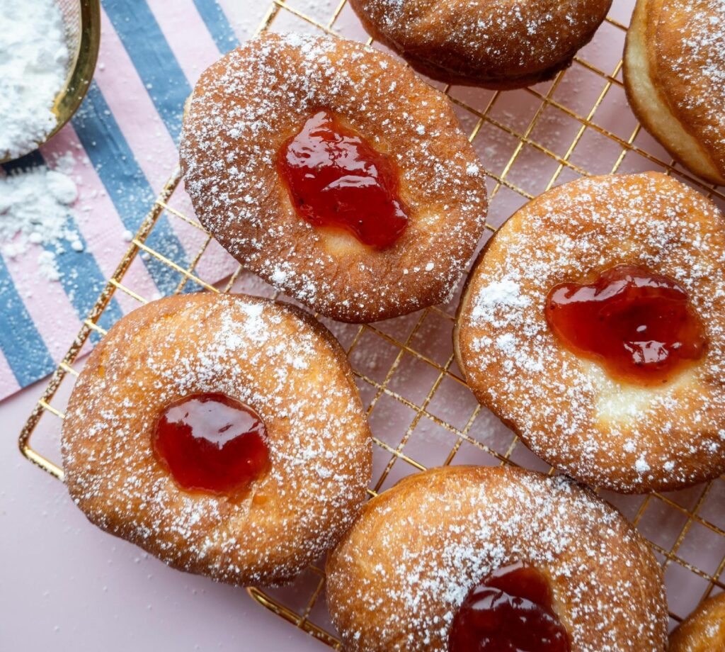 Assorted glazed and filled doughnuts from Inbaa’s, soft and sweet